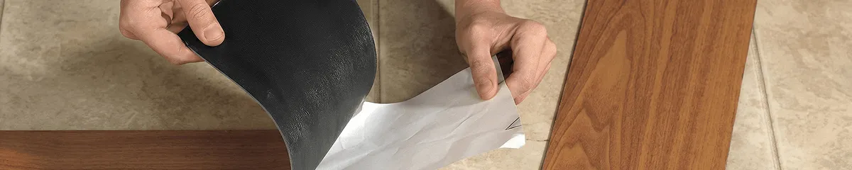 A professional installing vinyl flooring in Richmond, VA